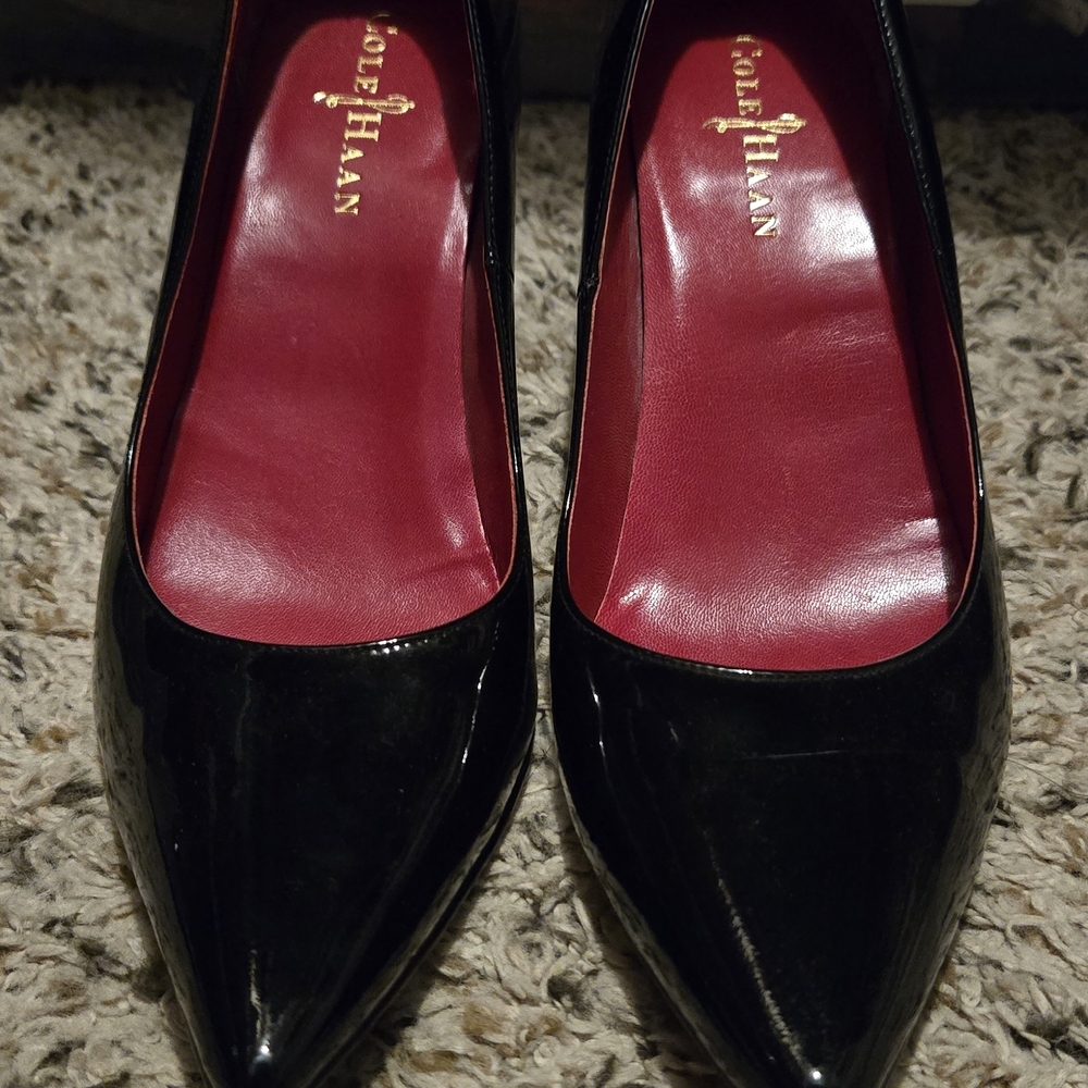 Cole Haan Glossy Black Heels with Bold Red Insole
